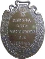 KZUS anverso